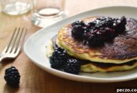 Zesty Lemon Ricotta Pancakes with Bursting Blackberries