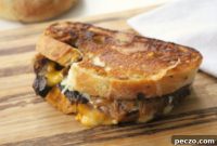 Decadent Braised Short Rib Grilled Cheese with Caramelized Onions