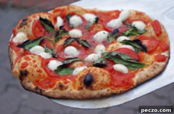 Wood-Fired Pizza Magic 1 A freshly baked wood-fired pizza with prosciutto on a wooden peel, ready to be served, capturing the essence of delicious homemade cooking.