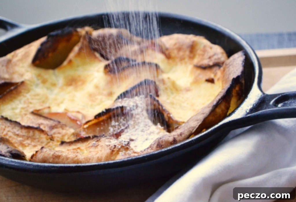 Close-up of a Puffed Apple Pancake with its signature rise