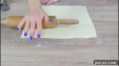 Rolling out puff pastry dough