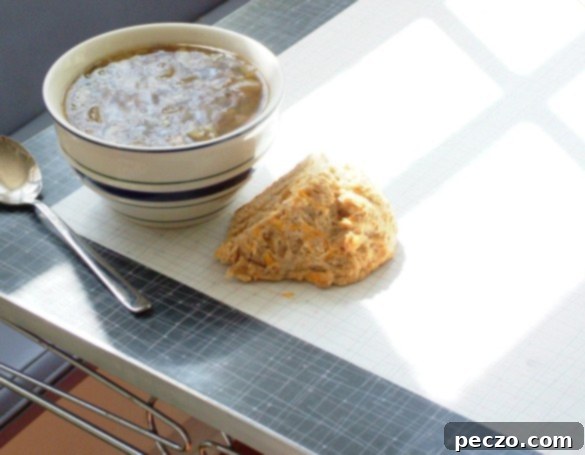 Hearty Lentil Soup served with a slice of freshly baked Irish Soda Bread, a perfect comfort food pairing.