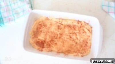Cinnamon and brown sugar sprinkled over cake batter