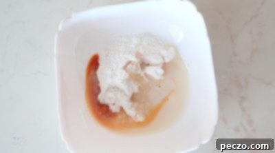 Ingredients for cake glaze in a bowl
