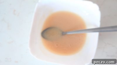 Smooth, pourable glaze being mixed