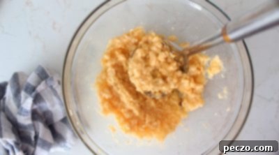 Ingredients for streusel topping being mixed with a fork