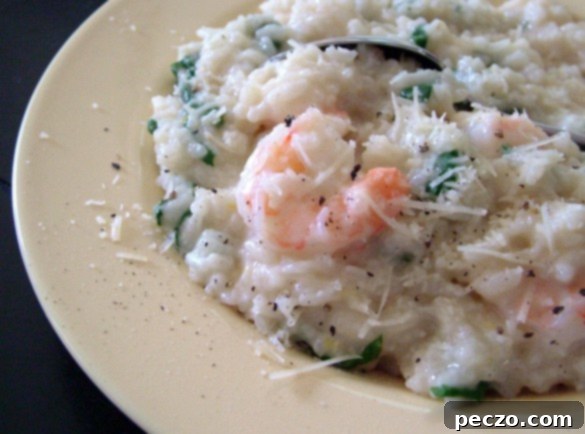 Creamy Shrimp and Spinach Risotto served in a bowl, garnished with fresh herbs, showcasing its rich texture.