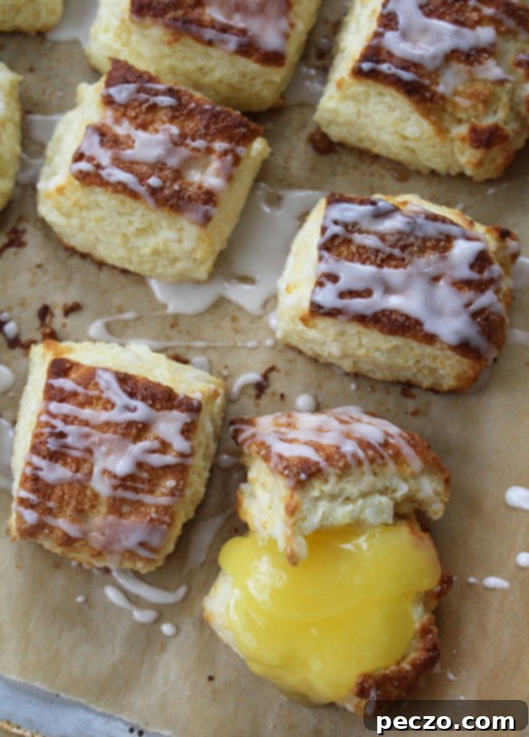 Meyer Lemon Scones beautifully arranged with a bowl of vibrant lemon curd.