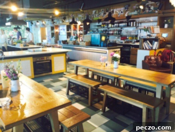 FullSizeRender copy 2 - An intimate shot inside Recipease, possibly during the wait for Jamie Oliver, showing the elegant setup and fresh arrangements.