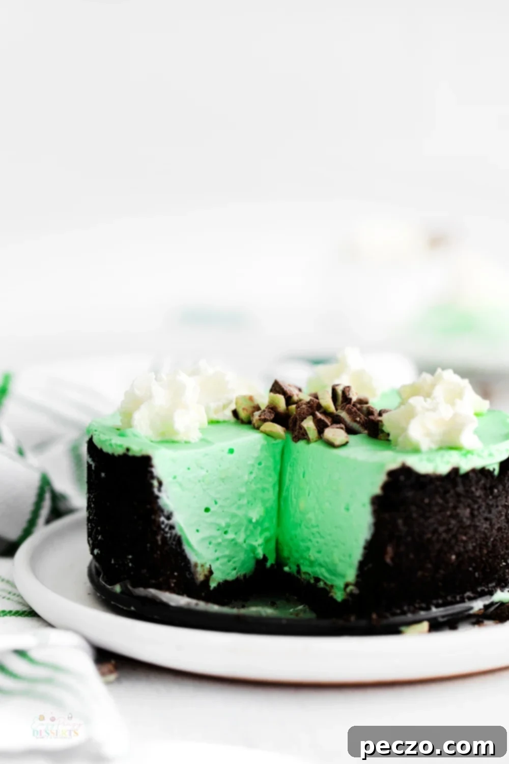 Grasshopper cheesecake with rich chocolate cookie crust