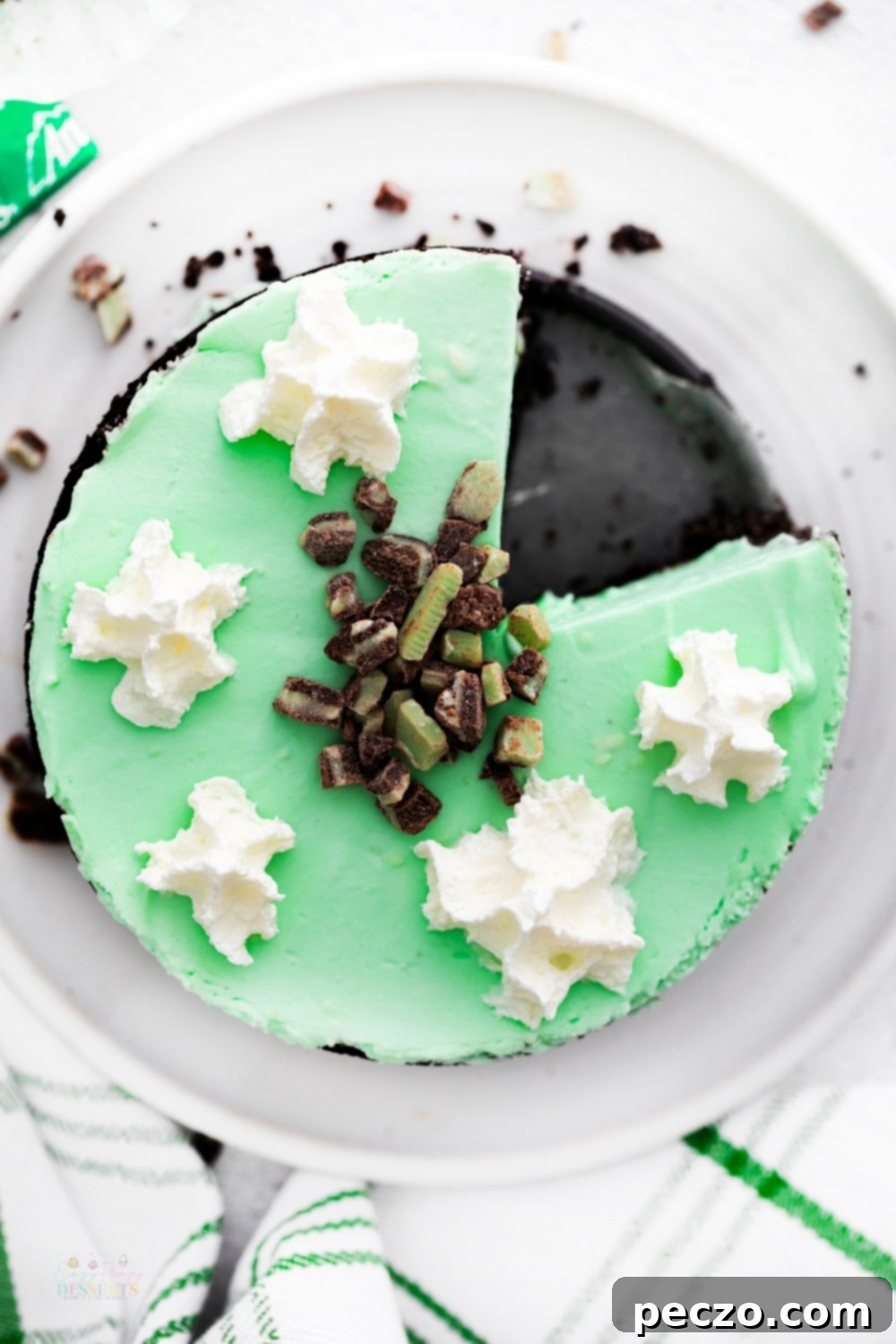 Crème de menthe cheesecake decorated with chocolate curls