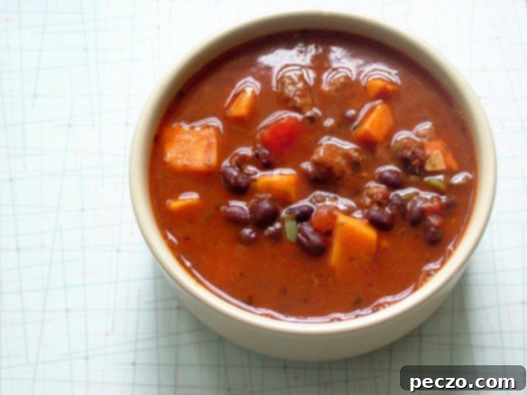 Delicious Sausage, Black Bean & Sweet Potato Soup in a bowl