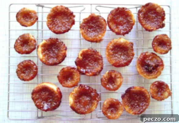Delicious homemade Canadian Butter Tarts, featuring a golden, flaky crust and a sweet, gooey filling, with a hint of caramelization. Perfect for any gathering or a cozy treat.