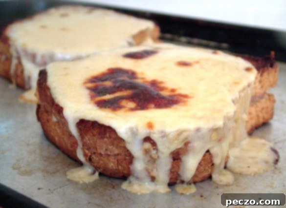 Classic Croque Monsieur sandwich with melted cheese and ham