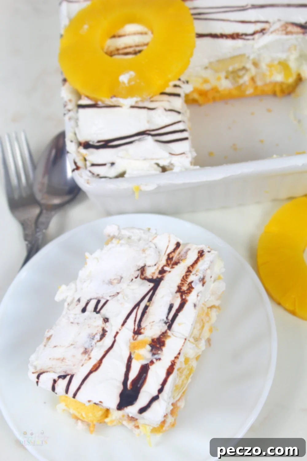 Image of banana split cake shot from above the plate