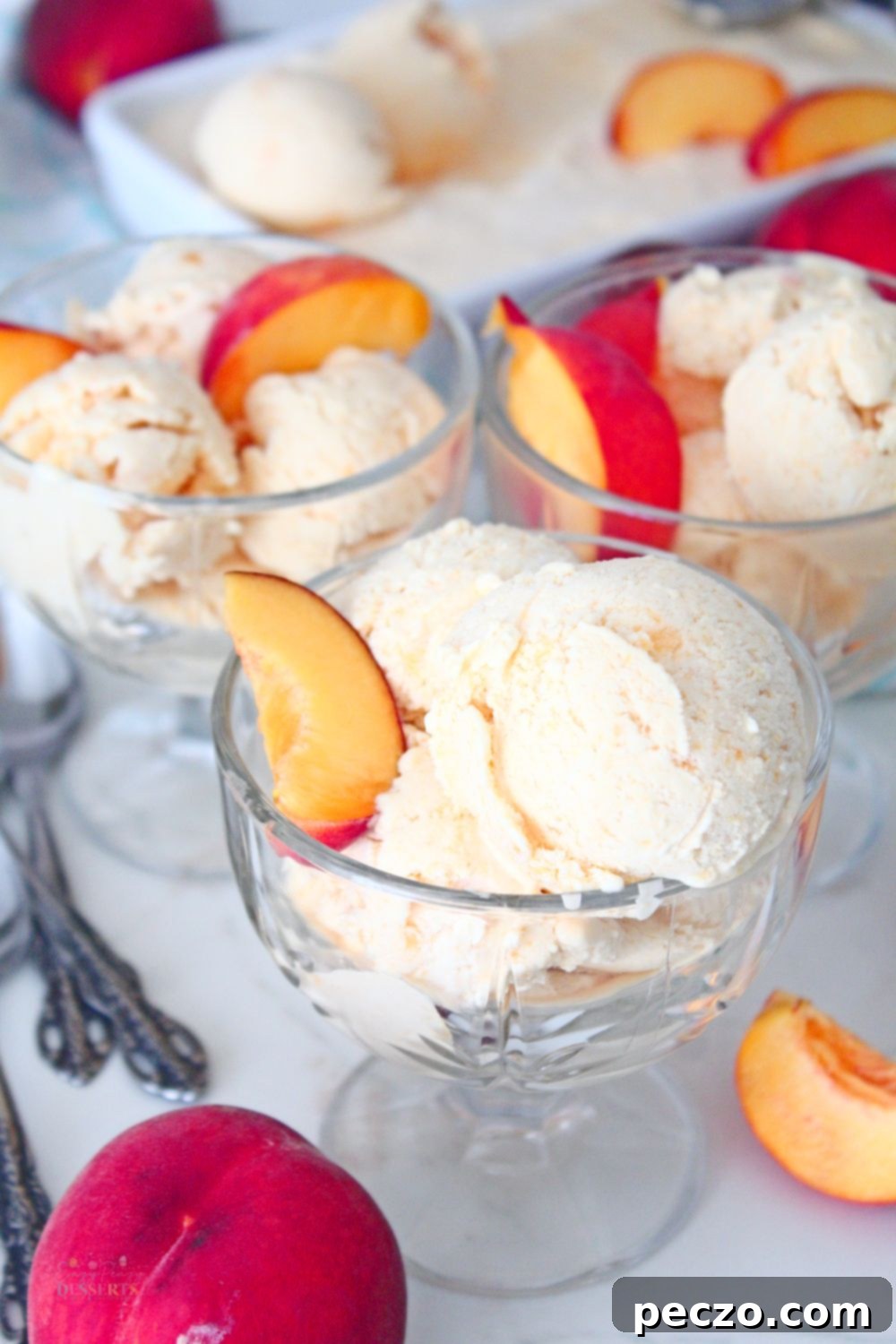 Peaches and cream ice cream in ice cream bowls