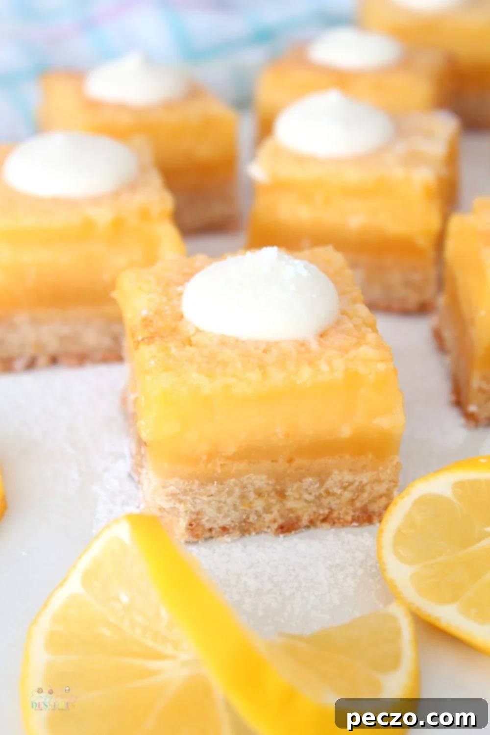 close up view of bright yellow lemon dessert squares