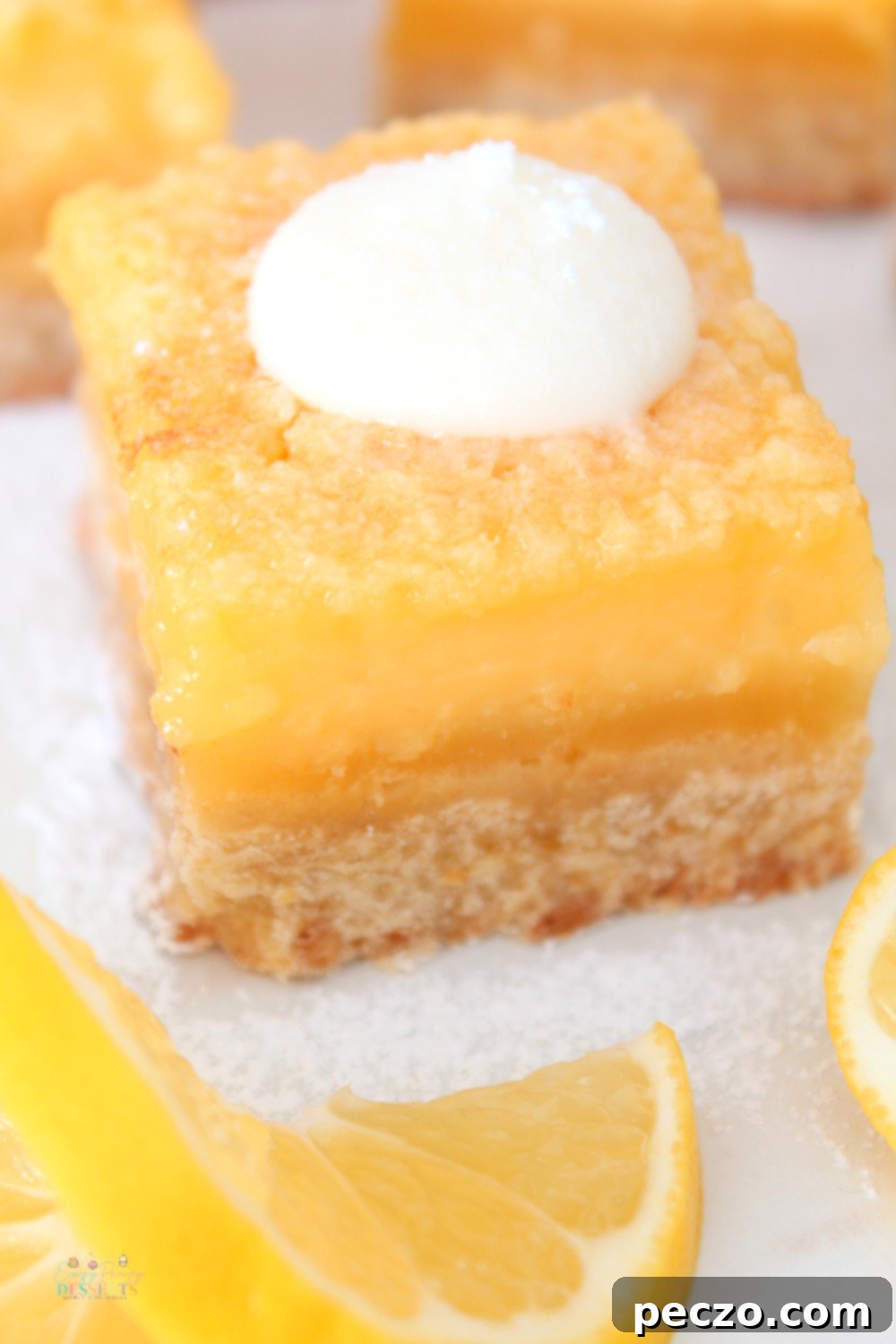 close up view of a lemon square, freshly baked