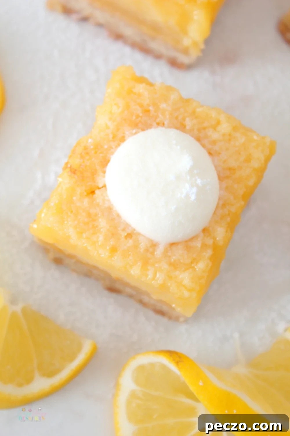 overhead view of a lemon square on a cooling rack