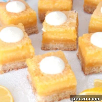 Image of lemon squares with cream cheese icing on top