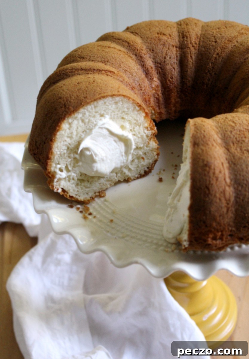 Delicious Twinkie-inspired bundt cake, golden yellow with creamy white filling