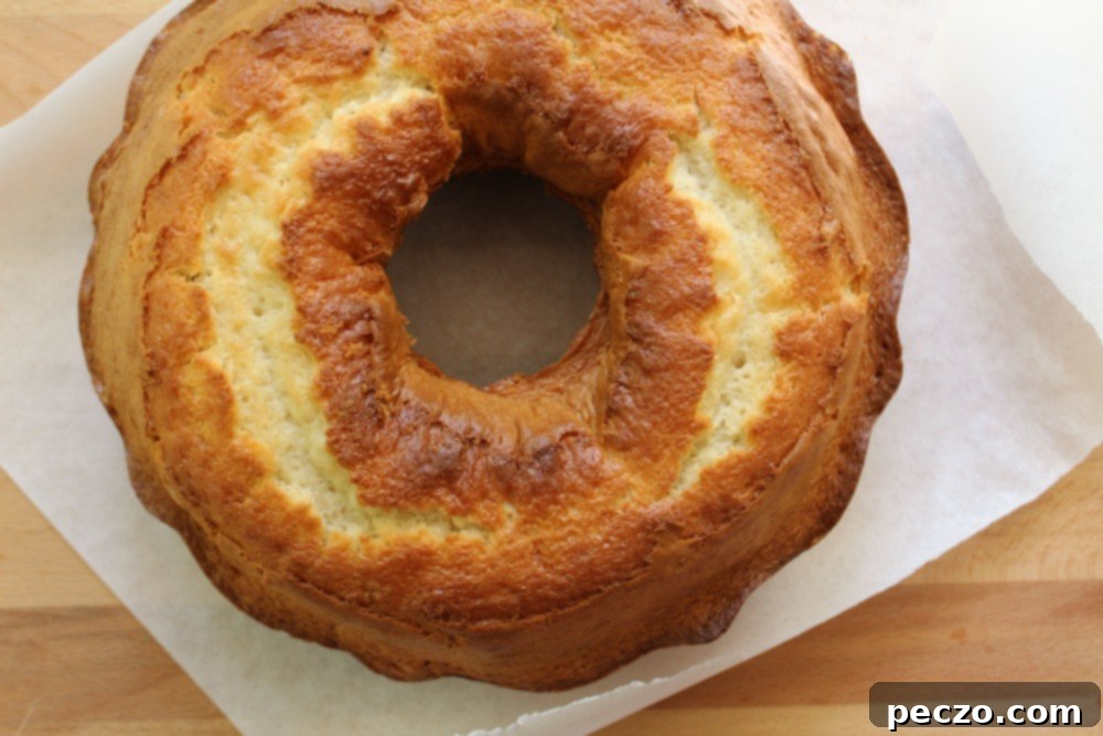 A bundt cake cooling on a wire rack, ready for the signature filling