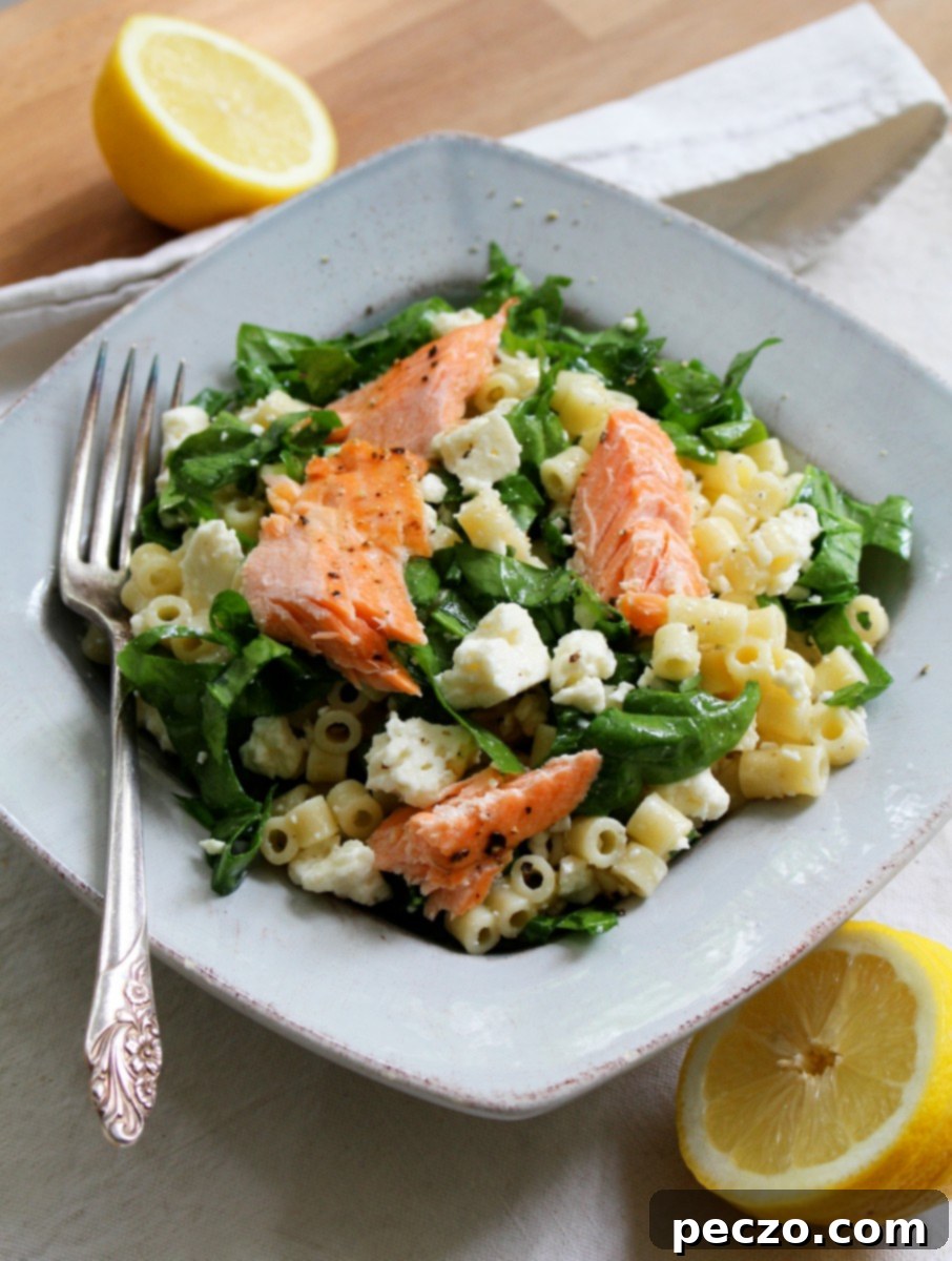 Vibrant Spinach & Feta Pasta Salad with fresh greens and creamy feta cheese, perfect for a summer gathering