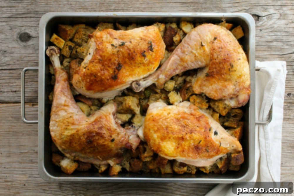 deconstructed turkey pieces on a baking sheet