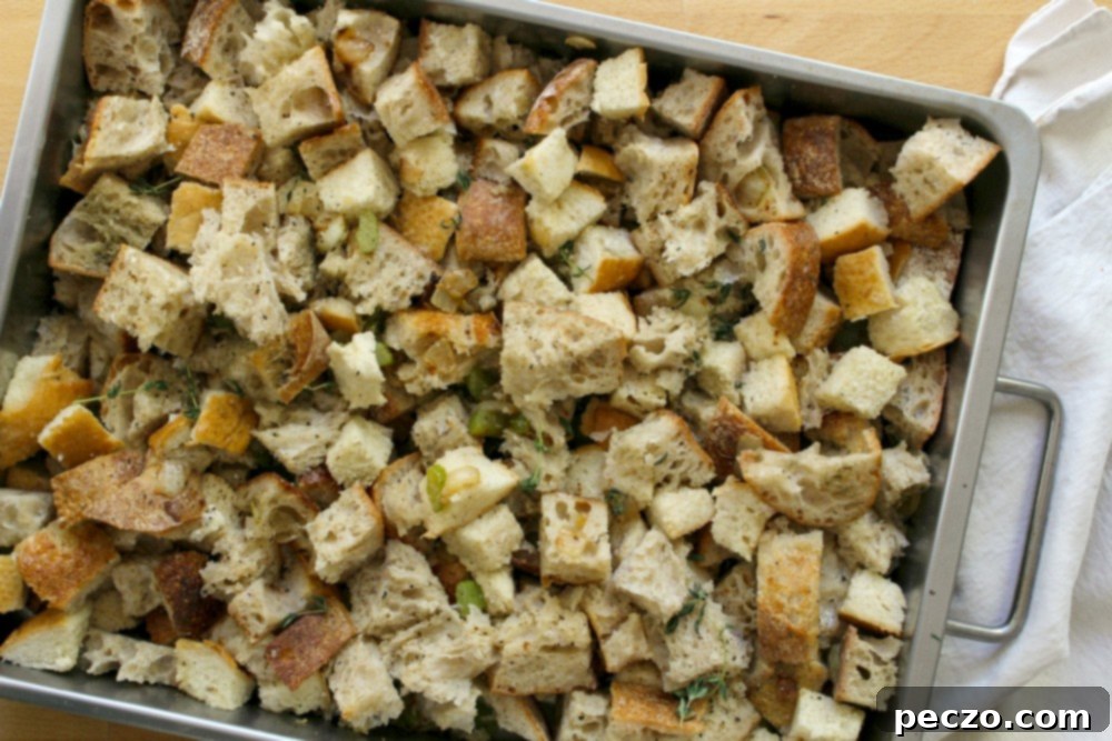 stuffing spread in a roasting pan