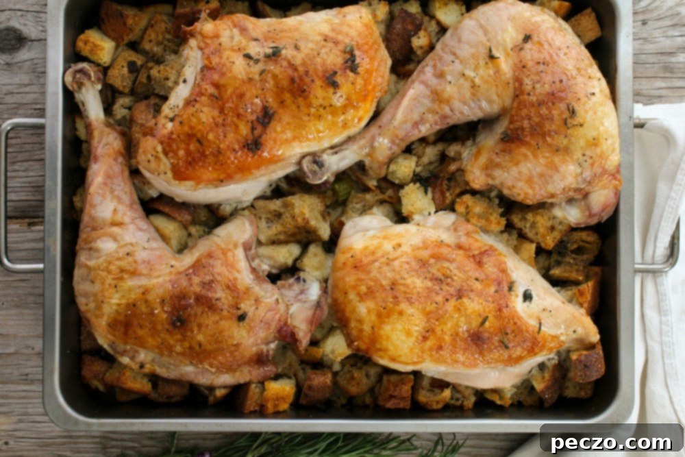 close up of carved deconstructed turkey and stuffing