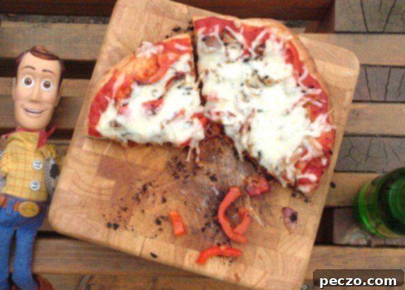 Delicious pizza cooking on an outdoor grill