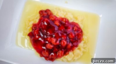 Crushed pineapple and cherry pie filling in a baking pan