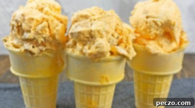 Pumpkin ice cream in three ice cream cones