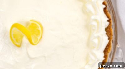 Close up image of a whole lemon pie