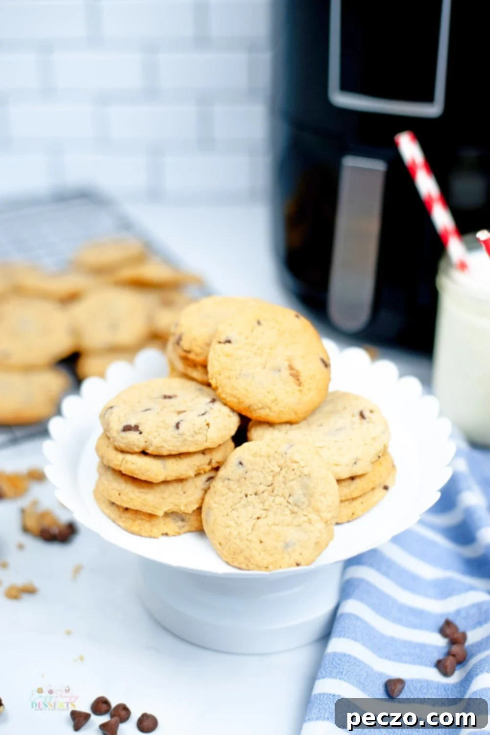Image of air fryer chocolate chip cookies in a dessert plate, photographed from front view