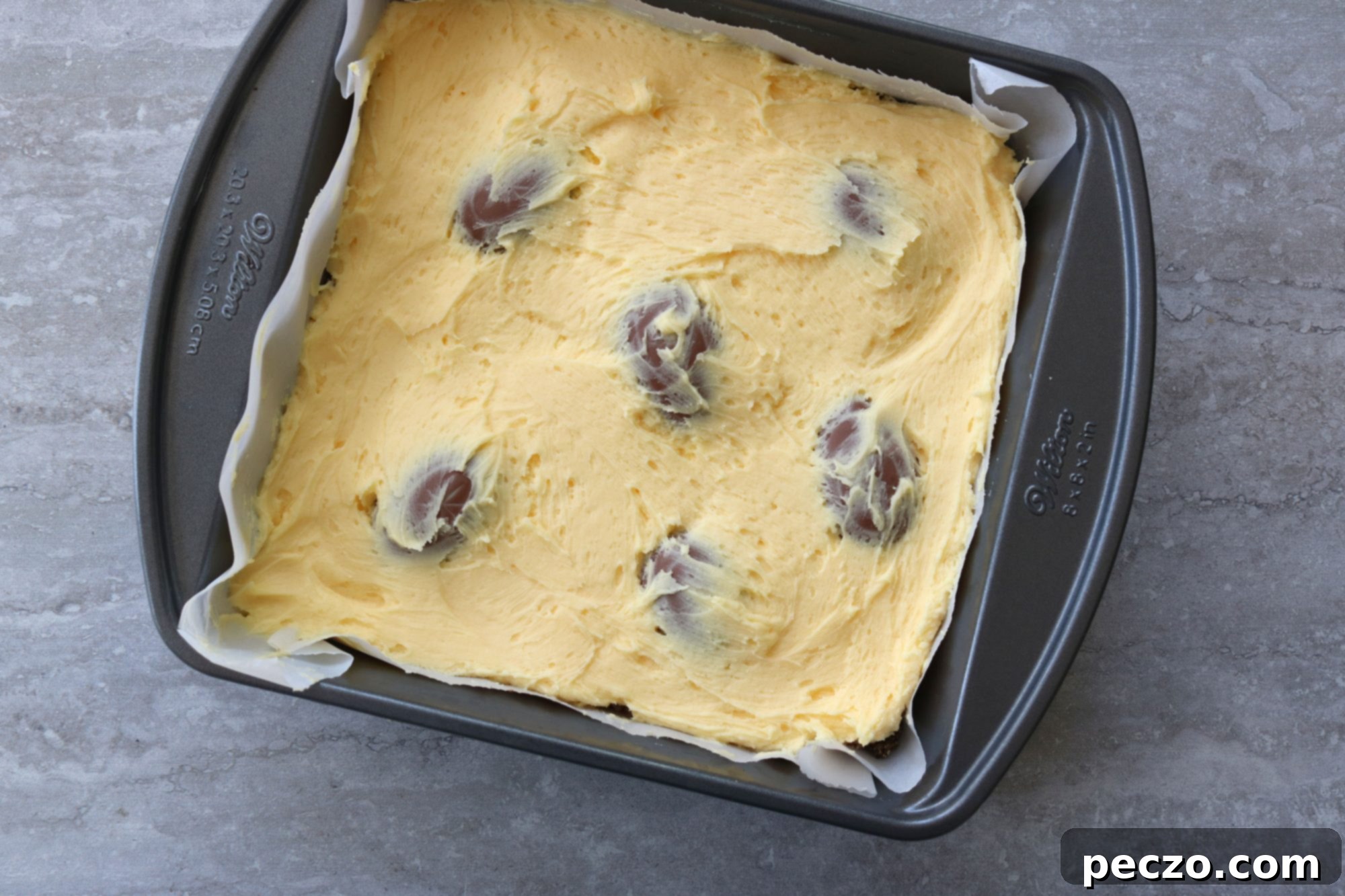 Close up of the creamy Nanaimo Bar filling