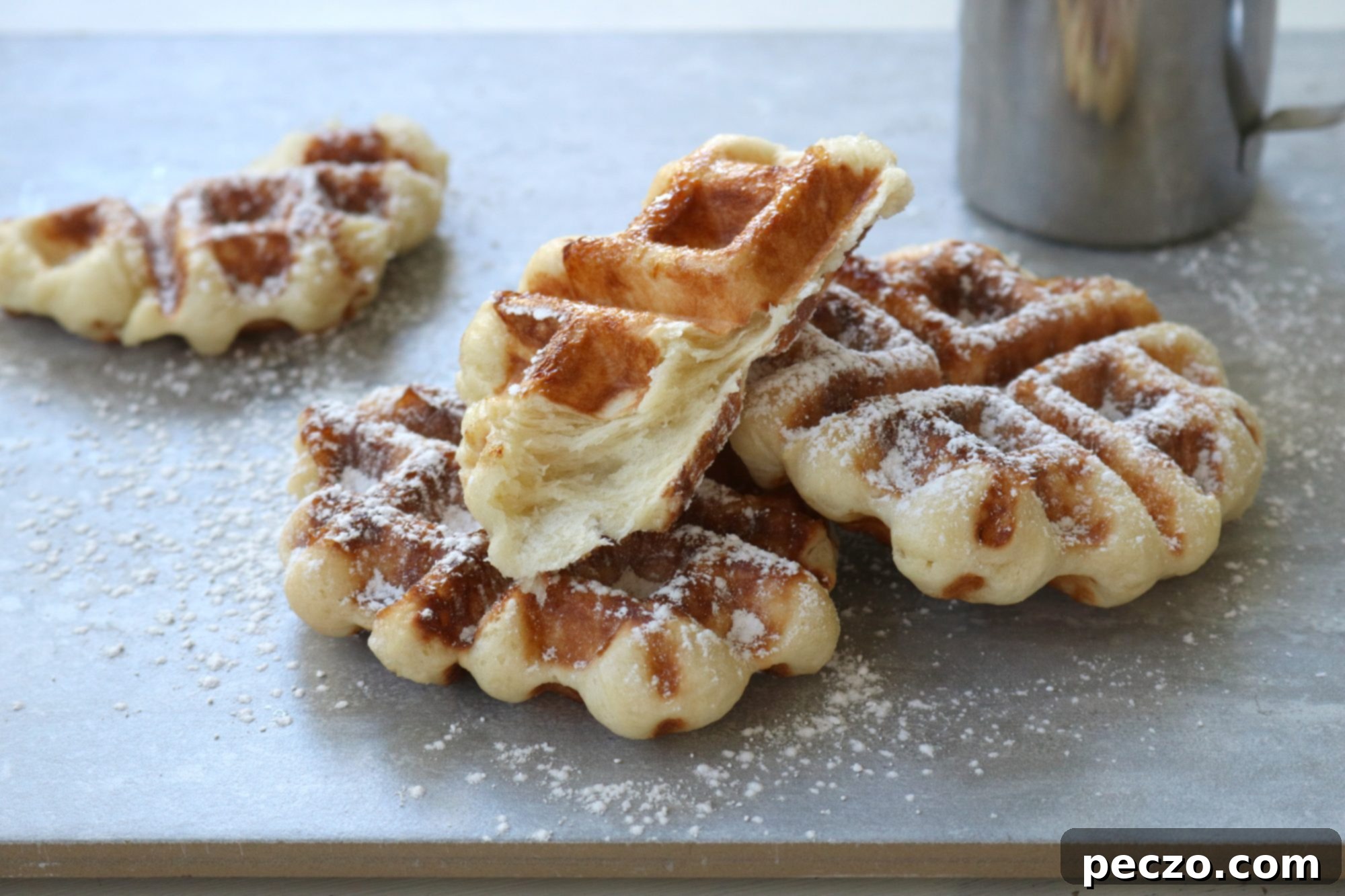 A stack of golden brown Liège waffles, ready to be served