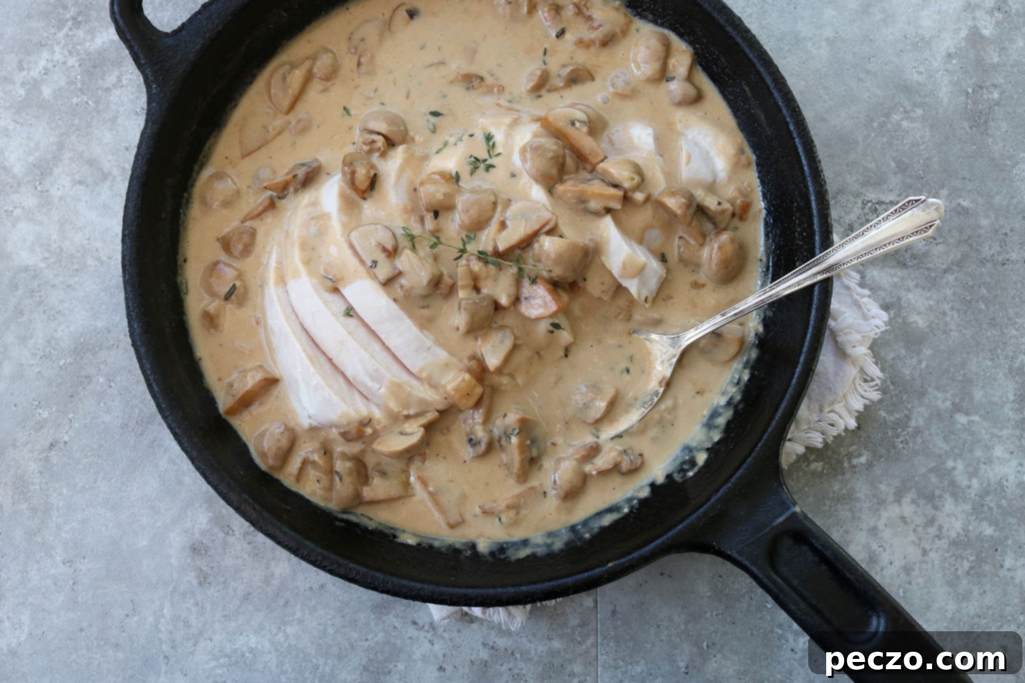 Another perspective of the smothered turkey in a pot, showcasing its rich, inviting texture.