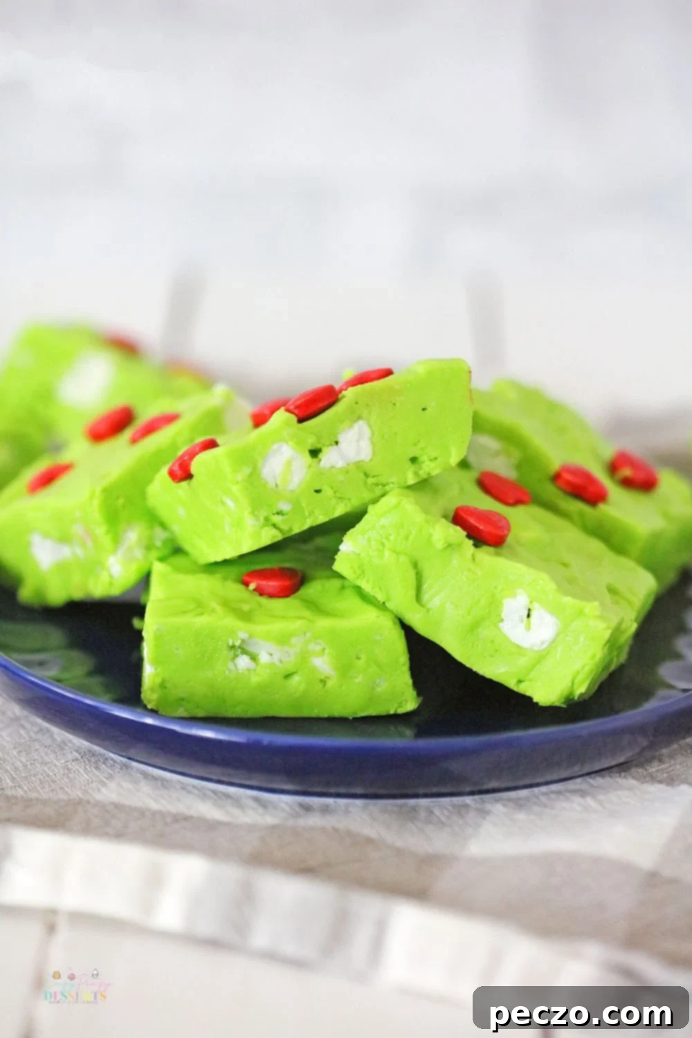 Image of green fudge for Christmas, with red hearts and white marshmallows