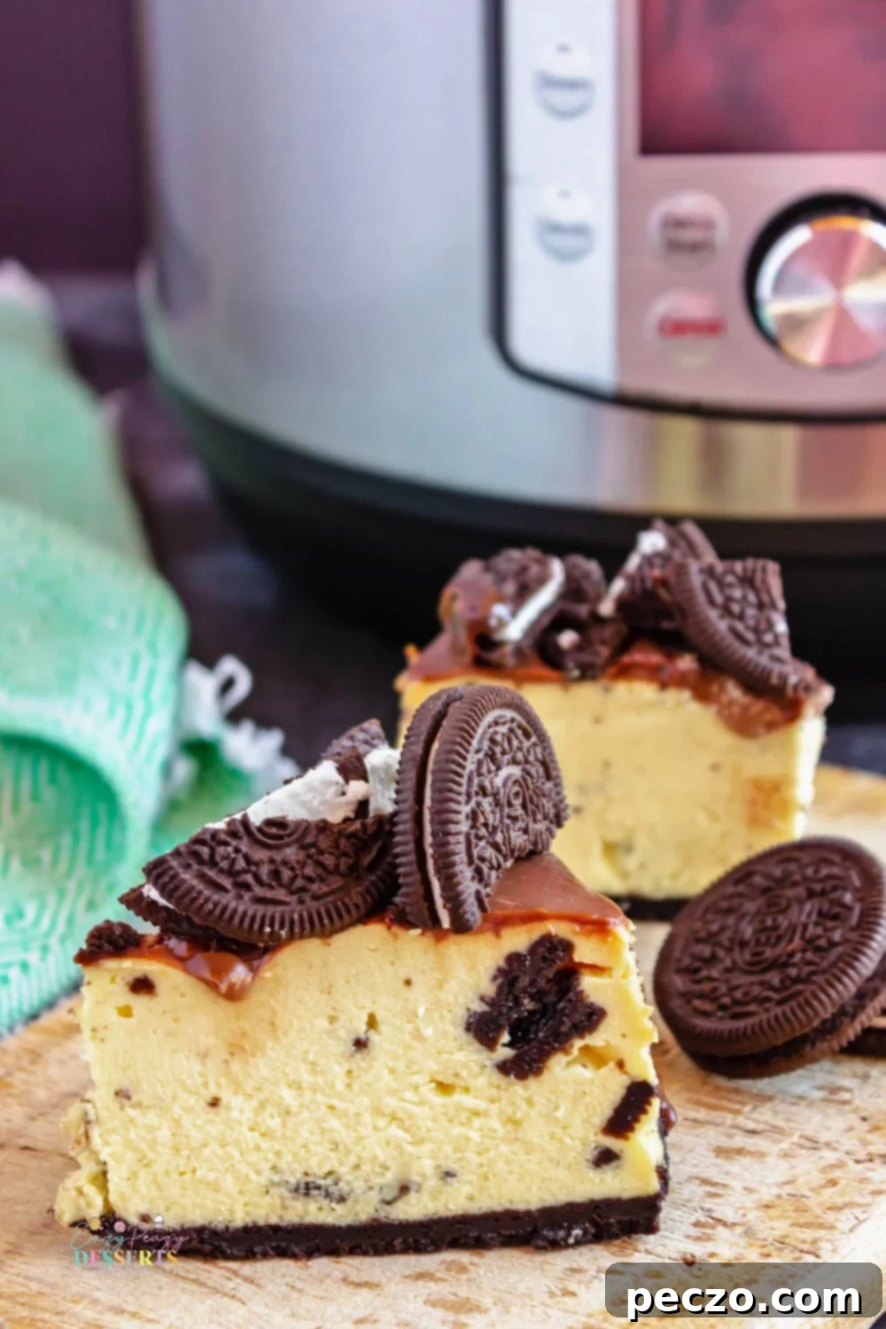 Close up image of a slice of Instant Pot Oreo cheesecake