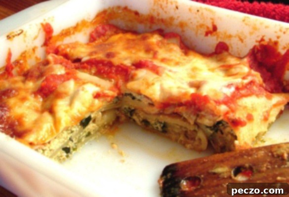 Giant penne pasta baked with goat cheese, spinach, and zucchini