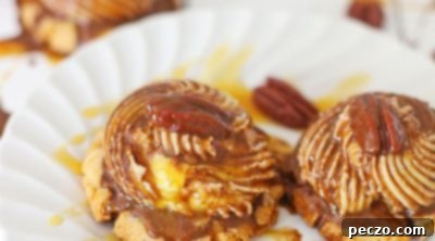 A couple of turtle cookies drizzled with caramel and chocolate sauce