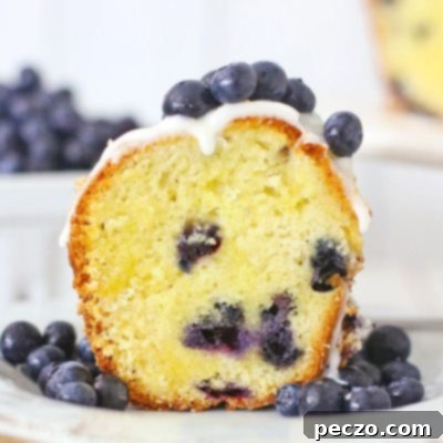 Image of donut Bundt cake with vanilla glaze and blueberries