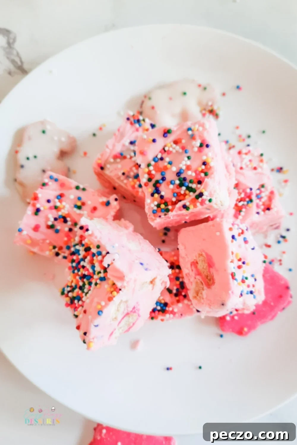 Over head image of strawberry chocolate fudge with sprinkles