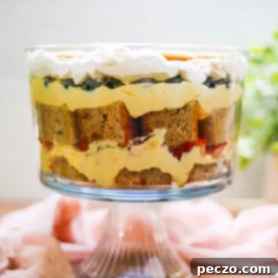 Close up image of strawberry banana trifle in a trifle bowl