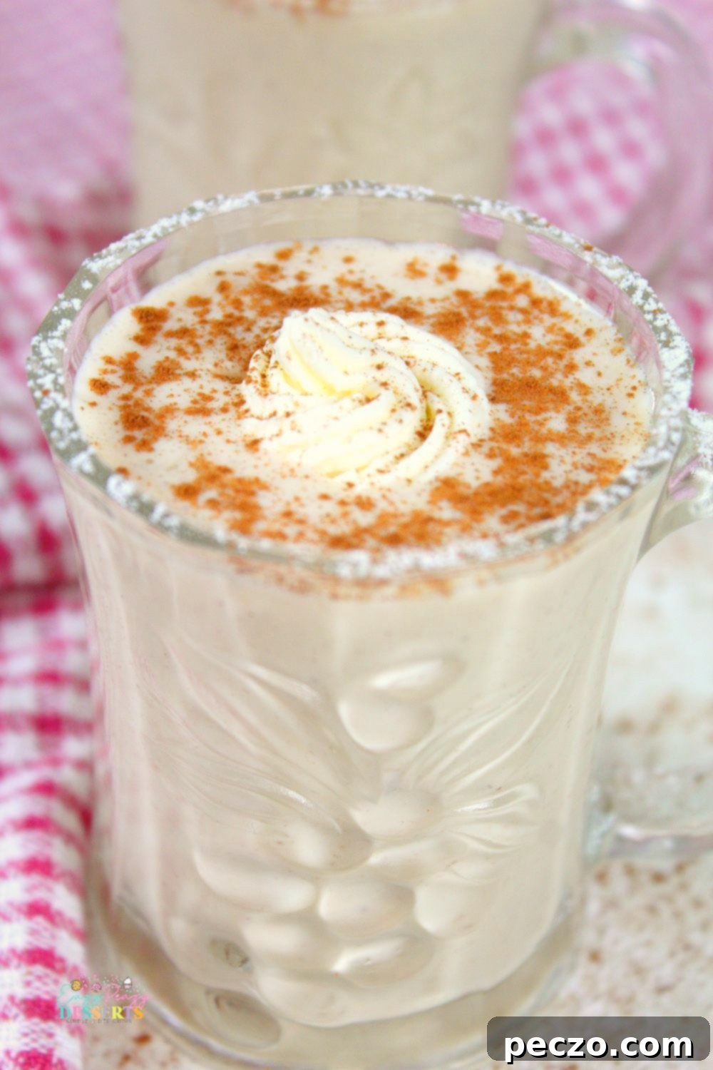 Close up image of non alcoholic eggnog in a mug