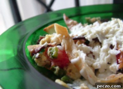Spicy Scrambled Eggs with Crispy Tortilla and Queso Fresco