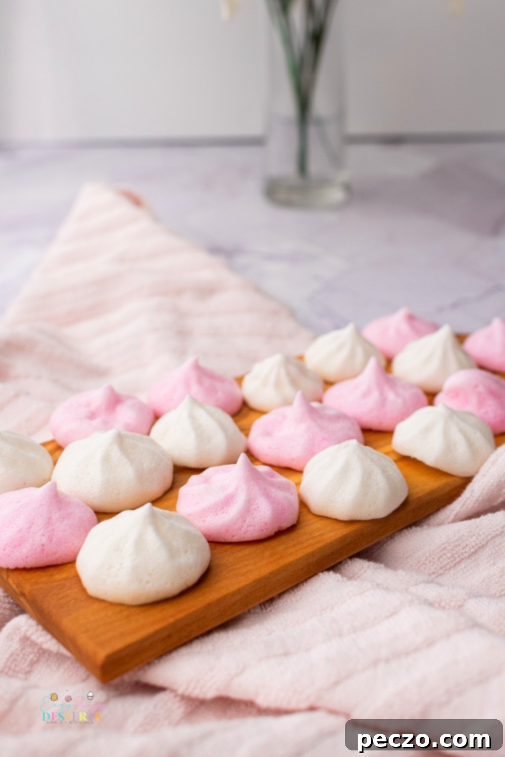 Aquafaba meringue cookies on a wooden tray