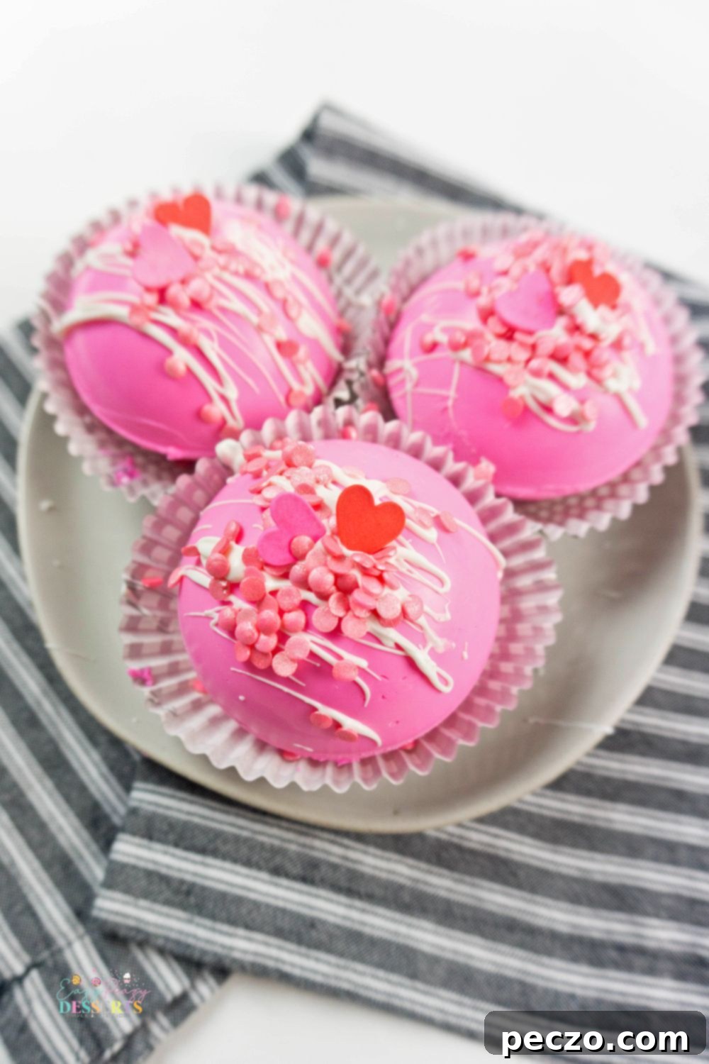 Over head image of pink Valentine's day chocolate bombs