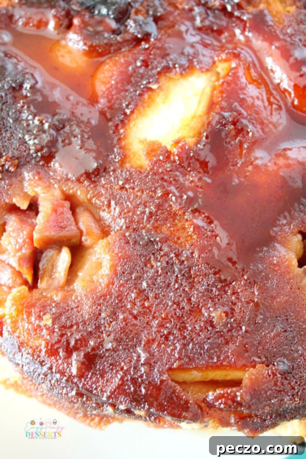Overhead image of a complete caramel apple upside down cake, beautifully presented